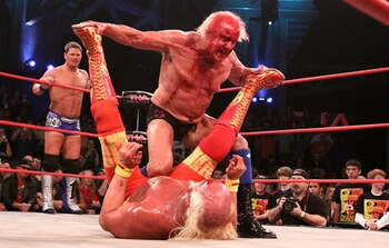 Flair beating up Hulkster for making him come to TNA