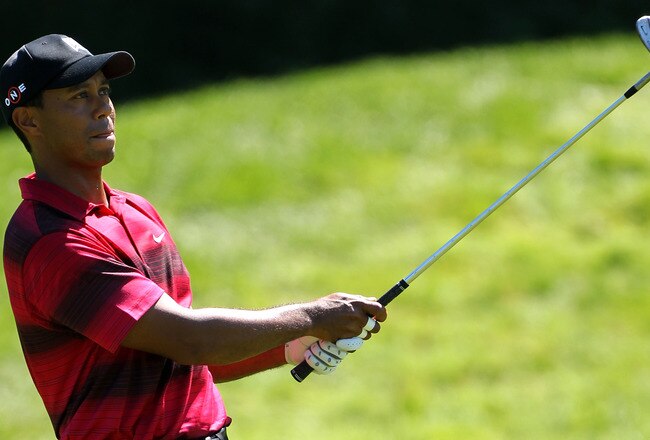 PARAMUS, NJ - AUGUST 29:  Tiger Woods watches his shot from the fairway on the third hole during the final round of The Barclays at the Ridgewood Country Club on August 29, 2010 in Paramus, New Jersey.  (Photo by Hunter Martin/Getty Images)