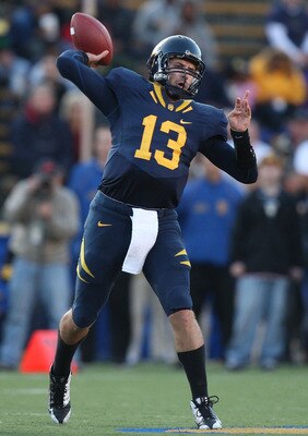 BERKELEY, CA - NOVEMBER 14:  Kevin Riley #13 of the California Golden Bears passes against the Arizona Wildcats at California Memorial Stadium on November 14, 2009 in Berkeley, California.  (Photo by Jed Jacobsohn/Getty Images)