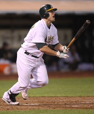 OAKLAND, CA - AUGUST 19:  Cliff Pennington #2 of the Oakland Athletics hits a two run double against the Tampa Bay Rays in the sixth inning during an MLB game at the Oakland-Alameda County Coliseum on August 19, 2010 in Oakland, California.  (Photo by Jed