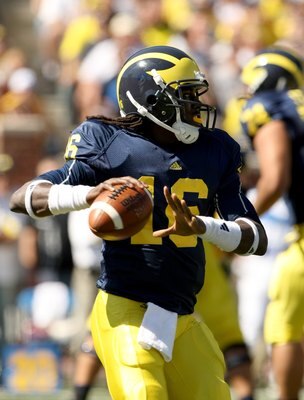 ANN ARBOR, MI - SEPTEMBER 19:  Quarterback Denard Robinson #16 of the Michigan Wolverines throws a pass against the Eastern Michigan Eagles at Michigan Stadium on September 19, 2009 in Ann Arbor, Michigan.  Michigan won 45-17.  (Photo by Stephen Dunn/Gett