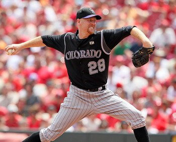 CINCINNATI - JULY 18:  Aaron Cook #28 of the Colorado Rockies throws a pitch during the game against the Cincinnati Reds at Great American Ball Park on July 18, 2010 in Cincinnati, Ohio.  (Photo by Andy Lyons/Getty Images)