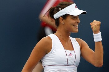 CINCINNATI - AUGUST 11:  Ana Ivanovic of Serbia celebrates match point against Yarolslava Shvedova of Kazakhstan during day three of the Western & Southern Financial Group Women's Open on August 11, 2010 at the Lindner Family Tennis Center in Cincinnati, 