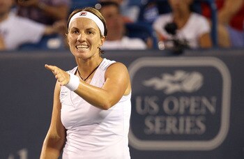 CINCINNATI - AUGUST 10:  Svetlana Kuznetsova of Russia reacts to a point against Maria Sharapova of Russia during day two of the Western & Southern Financial Group Women's Open on August 10, 2010 at the Lindner Family Tennis Center in Cincinnati, Ohio.  (