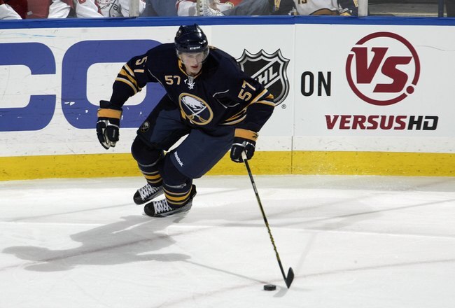 BUFFALO, NY - MARCH 3:  Tyler Myers #57 of the Buffalo Sabres skates with the puck during the game against the Washington Capitals at HSBC Arena on March 3, 2010 in Buffalo, New York. (Photo by Rick Stewart/Getty Images)