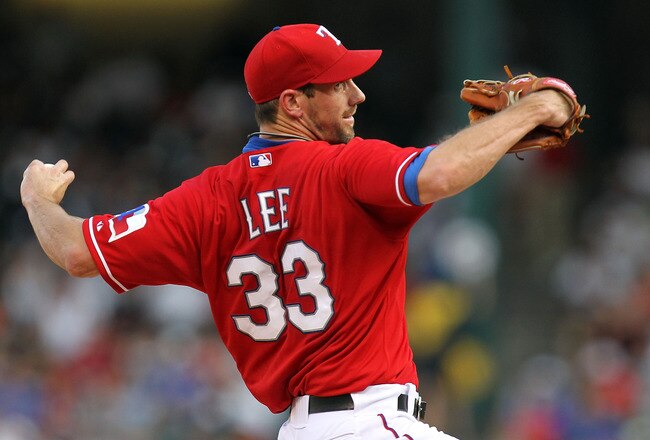ARLINGTON, TX - JULY 22:  Pitcher Cliff Lee #33 of the Texas Rangers throws against the Los Angeles Angels of Anaheim on July 22, 2010 at Rangers Ballpark in Arlington, Texas.  (Photo by Ronald Martinez/Getty Images)