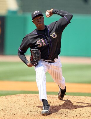 LOUISVILLE, KY - MAY 09:  Oroldis Chapman #51 of the Louisville Bats throws a pitch during the game against the Rochester Red Wings at Louisville Slugger Field on May 9, 2010 in Louisville, Kentucky.  (Photo by Andy Lyons/Getty Images)