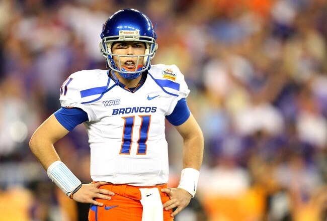 GLENDALE, AZ - JANUARY 04:  Quarterback Kellen Moore #11 of the Boise State Broncos looks over to his sideline in the second half against the TCU Horned Frogs during the Tostitos Fiesta Bowl at the Universtity of Phoenix Stadium on January 4, 2010 in Glen