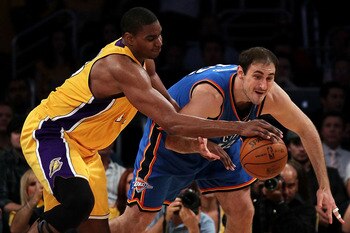 LOS ANGELES, CA - APRIL 27:  Andrew Bynum #17 of the Los Angeles Lakers and Nenad Krstic #12 of the Oklahoma City Thunder battle for the ball in the third period during Game Five of the Western Conference Quarterfinals of the 2010 NBA Playoffs at Staples 