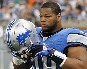 DETROIT - AUGUST 28: Ndamukong Suh #90 of the Detroit Lions looks on prior to playing the Cleveland Browns in a preseason game on August 28, 2010 at Ford Field in Detroit, Michigan.  (Photo by Gregory Shamus/Getty Images)
