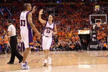 PHOENIX - MAY 29:  Steve Nash #13 and Grant Hill #33 of the Phoenix Suns celebrate after a play against the Los Angeles Lakers in the first quarter of Game Six of the Western Conference Finals during the 2010 NBA Playoffs at US Airways Center on May 29, 2