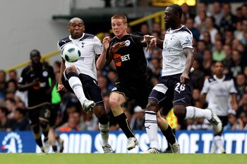 LONDON, ENGLAND - AUGUST 28:  Wilson Palacios (L) and Ledley King (R) of Tottenham battle for the ball with James McCarthy of Wigan during the Barclays Premier League match between Tottenham Hotspur and Wigan Athletic at White Hart Lane on August 28, 2010