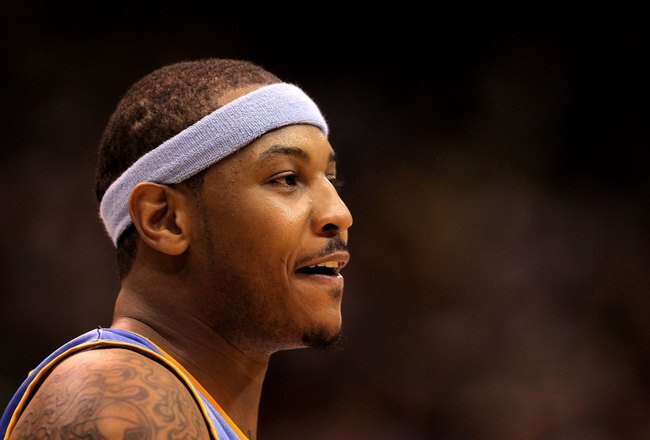 SALT LAKE CITY - APRIL 30:  Carmelo Anthony #15 of the Denver Nuggets stands on the court during their game against the Utah Jazz in Game Six of the Western Conference Quarterfinals of the 2010 NBA Playoffs at EnergySolutions Arena on April 30, 2010 in Sa