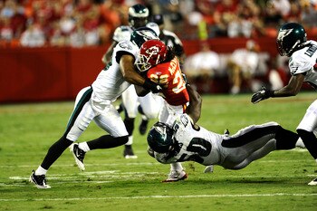 KANSAS CITY, MO - AUGUST 27: Dexter McCluster #22 of the Kansas City Chiefs is stopped by Nate Allen #29 and Ernie Sims #50 of the Philadelphia Eagles during a preseason game at Arrowhead Stadium on August 27, 2010 in Kansas City, Missouri.  (Photo by G.