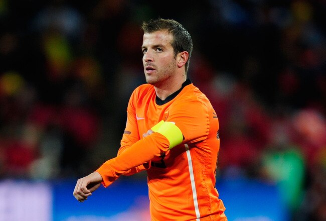 JOHANNESBURG, SOUTH AFRICA - JULY 11:  Rafael Van der Vaart of the Netherlands takes the captain's armband during the 2010 FIFA World Cup South Africa Final match between Netherlands and Spain at Soccer City Stadium on July 11, 2010 in Johannesburg, South