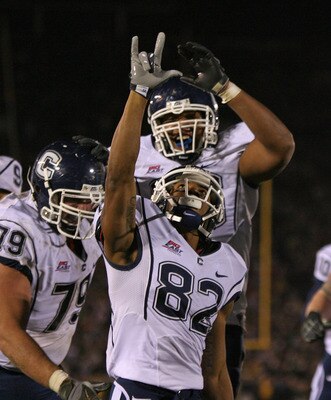 SOUTH BEND, IN - NOVEMBER 21: Kashif Moore #82 of the Univeristy of Connecticut Huskies celebrates an overtime touchdown catch against the Notre Dame Fighting Irish at Notre Dame Stadium on November 21, 2009 in South Bend, Indiana. Connecticut defeated No