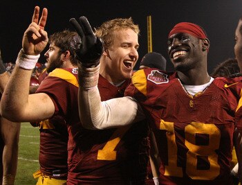 SAN FRANCISCO - DECEMBER 26: Matt Barkley #7 and Damian Williams #18 of the USC Trojans celebrate after defeating the Boston College Eagles during the 2009 Emerald Bowl at AT&T Park on December 26, 2009 in San Francisco, California. (Photo by Jed Jacobsoh