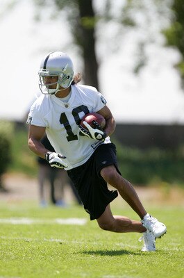 ALAMEDA, CA - MAY 08:  Todd Watkins #19 of the Oakland Raiders runs with the ball during the Raiders minicamp at the team's permanent training facility on May 8, 2009 in Alameda, California.  (Photo by Ezra Shaw/Getty Images)