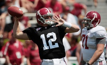 TUSCALOOSA, AL - APRIL 17: Quarterback Greg McElroy #12 of the University of Alabama looks for a receiver during the Alabama spring game at Bryant Denny Stadium on April 17, 2010 in Tuscaloosa, Alabama. (Photo by Dave Martin/Getty Images)