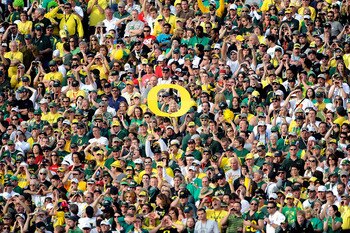 PASADENA, CA - JANUARY 01:  A view of fans of the Oregon Ducks during the 96th Rose Bowl game against the Ohio State Buckeyes on January 1, 2010 in Pasadena, California.  (Photo by Kevork Djansezian/Getty Images)