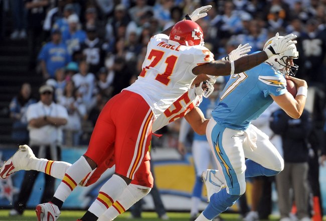 SAN DIEGO - NOVEMBER 29:  Philip Rivers #17 of the San Diego Chargers is chased by Alex Magee #71 and Derrick Johnson #56 of the Kansas City Chiefs at Qualcomm Stadium on November 29, 2009 in San Diego, California.  (Photo by Harry How/Getty Images)
