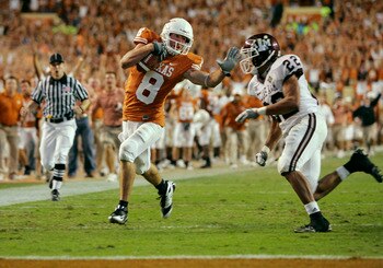AUSTIN, TX - NOVEMBER 27:  Wide receiver Jordan Shipley #8 of the Texas Longhorns sets up a touchdown with a 68-yard gain against defensive back Trent Hunter #22 of the Texas A&M Aggies at the end of the third quarter at Darrell K Royal-Texas Memorial Sta