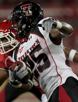 HOUSTON - SEPTEMBER 26:  Running back Baron Batch #25 of the Texas Tech Red Raiders rushes against the Houston Cougars at Robertson Stadium on September 26, 2009 in Houston, Texas.  (Photo by Thomas B. Shea/Getty Images)