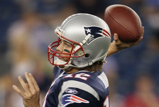 FOXBORO, MA - AUGUST 26:  Tom Brady #12 of the New England Patriots passes the ball in the first half against the St. Louis Rams on August 26, 2010 at Gillette Stadium in Foxboro, Massachusetts.  (Photo by Elsa/Getty Images)