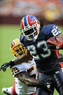 LANDOVER, MD - AUGUST 13:  Marshawn Lynch #23 of the Buffalo Bills is tackled during the preseason game by London Fletcher #59 of the Washington Redskins at FedEx Field on August 13, 2010 in Landover, Maryland.  (Photo by Greg Fiume/Getty Images)