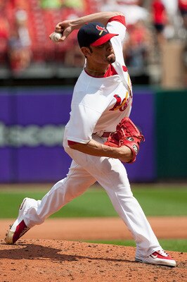 ST. LOUIS - AUGUST 22: Starter Jaime Garcia #54 of the St. Louis Cardinals pitches against the San Francisco Giants at Busch Stadium on August 22, 2010 in St. Louis, Missouri.  (Photo by Dilip Vishwanat/Getty Images)