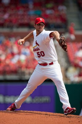 ST. LOUIS - AUGUST 18: Starting pitcher Adam Wainwright #50 of the St. Louis Cardinals throws to first base against the Milwaukee Brewers  at Busch Stadium on August 18, 2010 in St. Louis, Missouri.  The Brewers beat the Cardinals 3-2.  (Photo by Dilip Vi