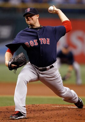 ST. PETERSBURG - AUGUST 27:  Pitcher Jon Lester #31 of the Boston Red Sox pitches against the Tampa Bay Rays during the game at Tropicana Field on August 27, 2010 in St. Petersburg, Florida.  (Photo by J. Meric/Getty Images)