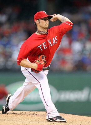 ARLINGTON, TX - JULY 23:  C.J. Wilson #36 of the Texas Rangers throws against the Los Angeles Angels of Anaheim on July 23, 2010 at Rangers Ballpark in Arlington, Texas.  (Photo by Ronald Martinez/Getty Images)