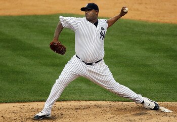 NEW YORK - AUGUST 22:  CC Sabathia #52 of the New York Yankees delivers a pitch against the Seattle Mariners on August 22, 2010 at Yankee Stadium in the Bronx borough of New York City.  (Photo by Jim McIsaac/Getty Images)
