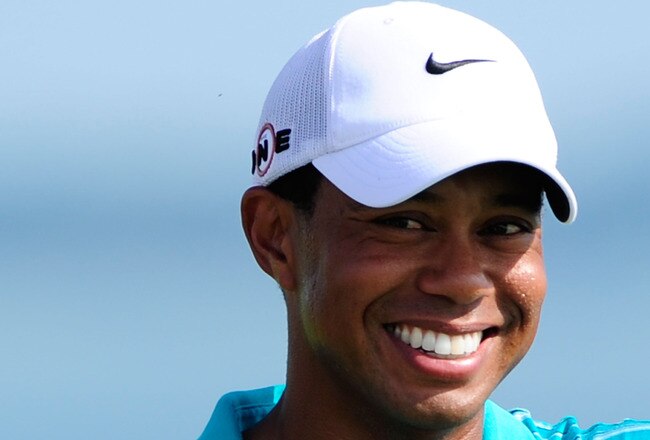 KOHLER, WI - AUGUST 14:  Tiger Woods smiles on the 15th tee during the continuation of the second round of the 92nd PGA Championship on the Straits Course at Whistling Straits on August 14, 2010 in Kohler, Wisconsin.  (Photo by Stuart Franklin/Getty Image