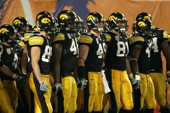 MIAMI GARDENS, FL - JANUARY 05:  The Iowa Hawkeyes get set to walk on the field against the Georgia Tech Yellow Jackets during the FedEx Orange Bowl at Land Shark Stadium on January 5, 2010 in Miami Gardens, Florida.  (Photo by Streeter Lecka/Getty Images