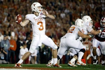 PASADENA, CA - JANUARY 07:  Quarterback Garrett Gilbert #3 of the Texas Longhorns drops back to pass against the Alabama Crimson Tide during the Citi BCS National Championship game at the Rose Bowl on January 7, 2010 in Pasadena, California.  (Photo by Je