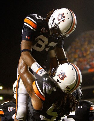 AUBURN, AL - SEPTEMBER 19:  Darvin Adams #89 of the Auburn Tigers celebrates his touchdown with Byron Isom #57 against the West Virginia Mountaineers at Jordan-Hare Stadium on September 19, 2009 in Auburn, Alabama.  (Photo by Kevin C. Cox/Getty Images)