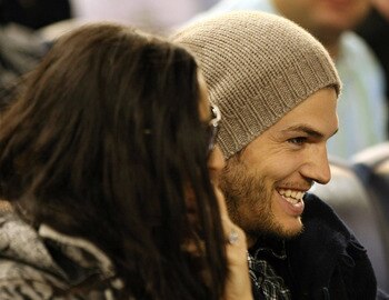 NEW YORK - APRIL 15:  Demi Moore (L) and Ashton Kutcher watch the New York Yankees game against the Los Angeles Angels of Anaheim on April 15, 2010 at Yankee Stadium in the Bronx borough of New York City.  (Photo by Al Bello/Getty Images)