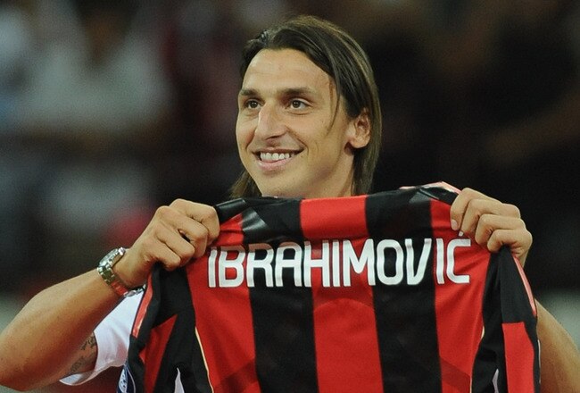 MILAN, ITALY - AUGUST 29:  New signing Zlatan Ibrahimovic holds up his shirt during the Serie A match between AC Milan and Lecce at Stadio Giuseppe Meazza on August 29, 2010 in Milan, Italy.  (Photo by Valerio Pennicino/Getty Images)