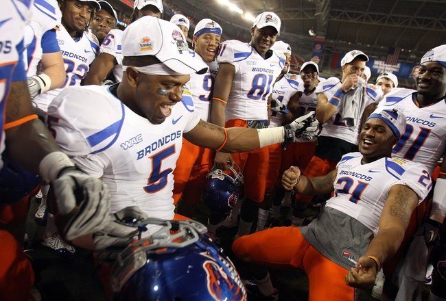 GLENDALE, AZ - JANUARY 04:  The Boise State Broncos celebrate after defeating the TCU Horned Frogs 17-10 during the Tostitos Fiesta Bowl at the Universtity of Phoenix Stadium on January 4, 2010 in Glendale, Arizona.  (Photo by Jed Jacobsohn/Getty Images)