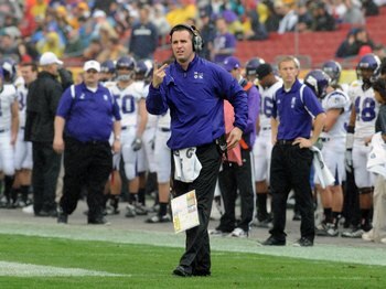 TAMPA, FL - JANUARY 1: Coach Pat Fitzgerald of the Northwestern Wildcats directs play against the Auburn Tigers in the Outback Bowl January 1, 2010 at Raymond James Stadium in Tampa, Florida.  (Photo by Al Messerschmidt/Getty Images)