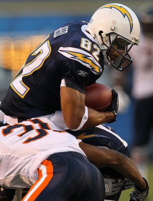 SAN DIEGO - AUGUST 14:   Wide receiver Josh Reed #82 of the San Diego Chargers carries the ball against the Chicago Bears on August 14, 2010 at Qualcomm Stadium in San Diego, California.   (Photo by Stephen Dunn/Getty Images)