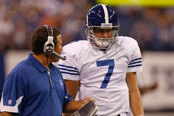 INDIANAPOLIS, IN - AUGUST 15:  Curtis Painter #7 of the Indianapolis Colts talks with a coach during the preseason game against the San Francisco 49ers at Lucas Oil Stadium on August 15, 2010 in Indianapolis, Indiana.  (Photo by Scott Boehm/Getty Images)