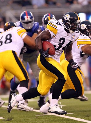 EAST RUTHERFORD, NJ - AUGUST 21: Rashard Mendenhall #34 of the Pittsburgh Steelers rushes against the New York Giants during their preseason game at New Meadowlands Stadium on August 21, 2010 in East Rutherford, New Jersey.  (Photo by Nick Laham/Getty Ima