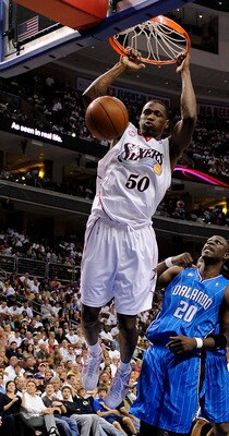 PHILADELPHIA - APRIL 24:  Theo Ratliff #50 of the Philadelphia 76ers dunks against Mickael Pietrus of the Orlando Magic during Game Three of the Eastern Conference Quarterfinals during the 2009 NBA Playoffs at the Wachovia Center on April 24, 2009 in Phil