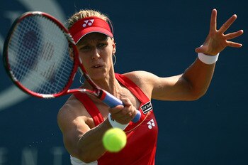 NEW YORK - SEPTEMBER 01:  Elena Dementieva of Russia hits a return against Sybille Bammer of Austria during her second round women's singles match on day three of the 2010 U.S. Open at the USTA Billie Jean King National Tennis Center on September 1, 2010