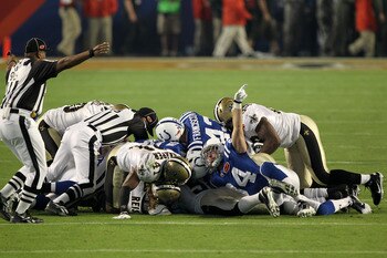 MIAMI GARDENS, FL - FEBRUARY 07:  The Indianapolis Colts fights for a loose ball against the New Orleans Saints after an onside kick to start the second half during Super Bowl XLIV on February 7, 2010 at Sun Life Stadium in Miami Gardens, Florida.  (Photo