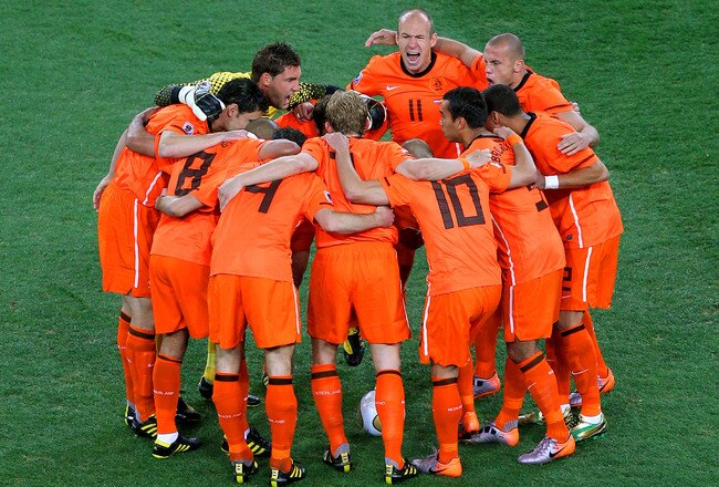 JOHANNESBURG, SOUTH AFRICA - JULY 11:  Arjen Robben of the Netherlands shouts encouragement to his team mates in the huddle ahead of the 2010 FIFA World Cup South Africa Final match between Netherlands and Spain at Soccer City Stadium on July 11, 2010 in
