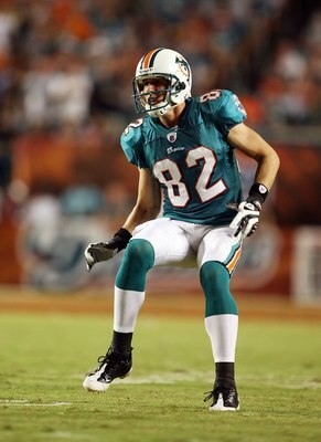 MIAMI - SEPTEMBER 21:  Wide receiver Brian Hartline #82 of the Miami Dolphins runs downfield to cover on a kick-off against the Indianapolis Colts at Land Shark Stadium on September 21, 2009 in Miami, Florida. The Colts defeated the Dolphins 27-23.  (Phot